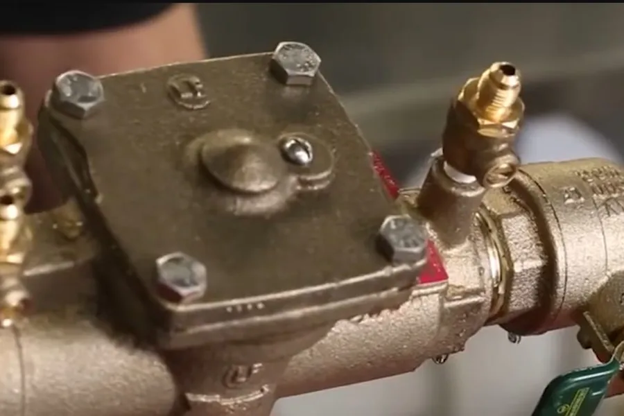Backflow prevention assembly connected to an irrigation line for Backflow Testing in Fountain Valley, Explained in Fountain Valley