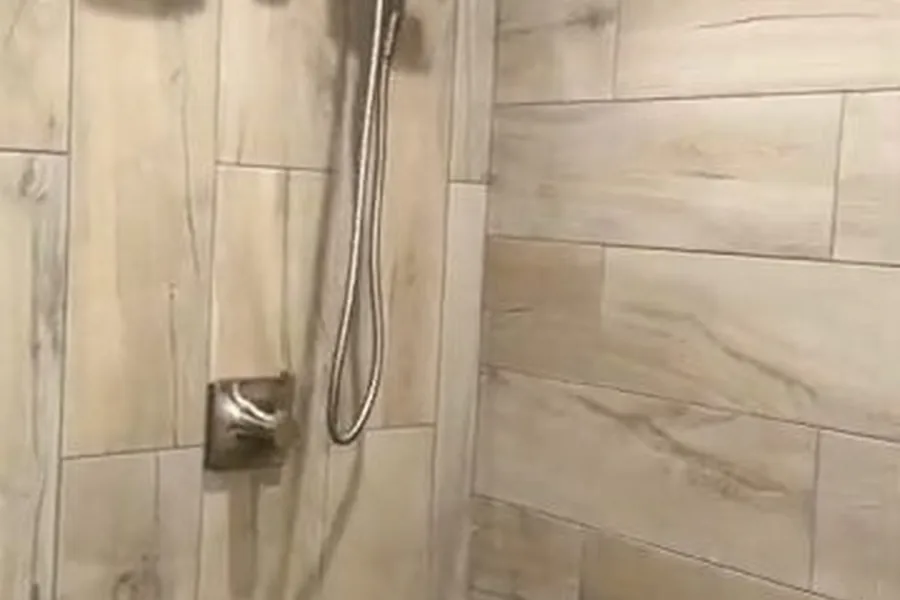 Bathroom remodel rough-in plumbing with open walls and fixtures for Plumber in Costa Mesa, CA in Costa Mesa