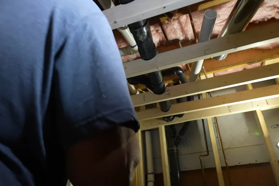 Crawlspace and basement plumbing lines being inspected or repaired for Remodel Plumbing in Fountain Valley, CA in Fountain Valley