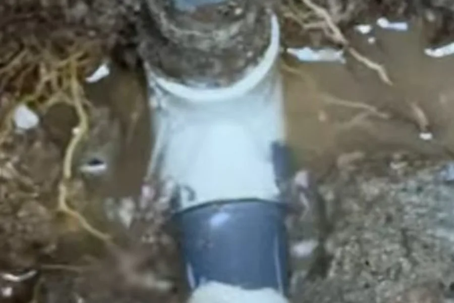 Excavated sewer lateral with damaged pipe exposed for repair for Sewer Line Repair in Fountain Valley, CA in Fountain Valley near the service area.