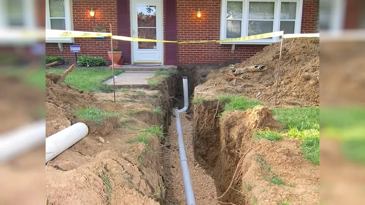 Excavated sewer lateral with damaged pipe exposed for repair for Trenchless Sewer Repair in Fountain Valley, CA in Fountain Valley