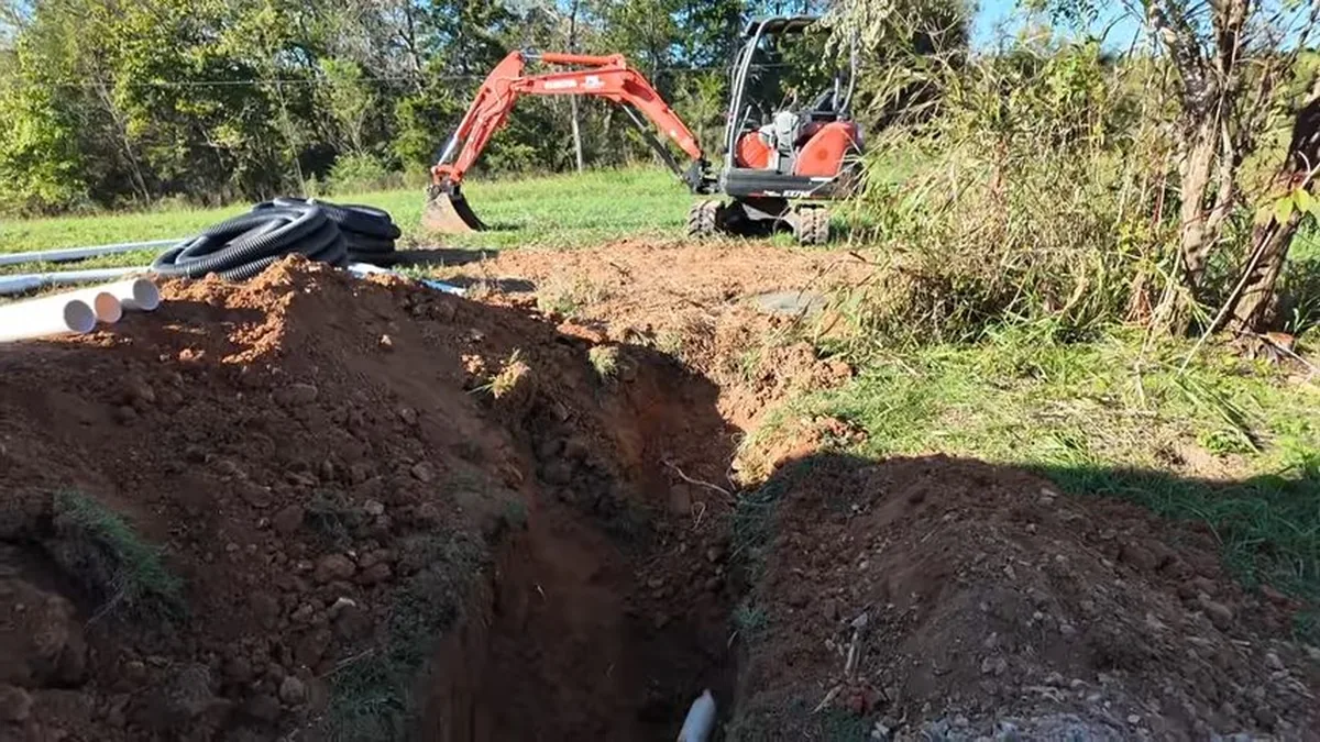Open trench with new underground pipe laid for replacement for Sewer Line Replacement in Fountain Valley, CA in Fountain Valley