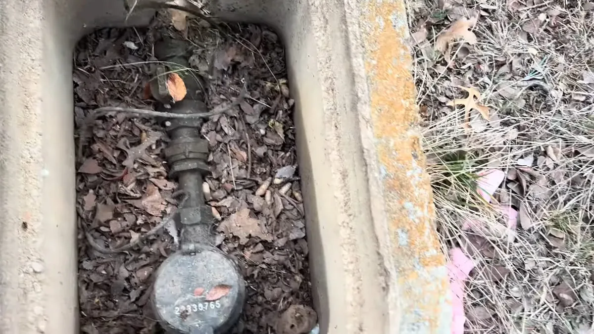 Outdoor hose bib valve and water supply connection being repaired for Plumber in Huntington Beach, CA in Huntington Beach