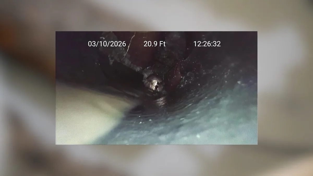 Sewer inspection camera and monitor showing the pipe interior for Tree Roots and Sewer Lines in Central Orange County in Fountain Valley