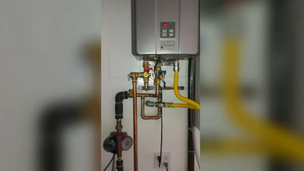 Water heater repair at the gas and water supply connections for Tankless vs. Tank Water Heaters for Orange County Homes in Fountain Valley