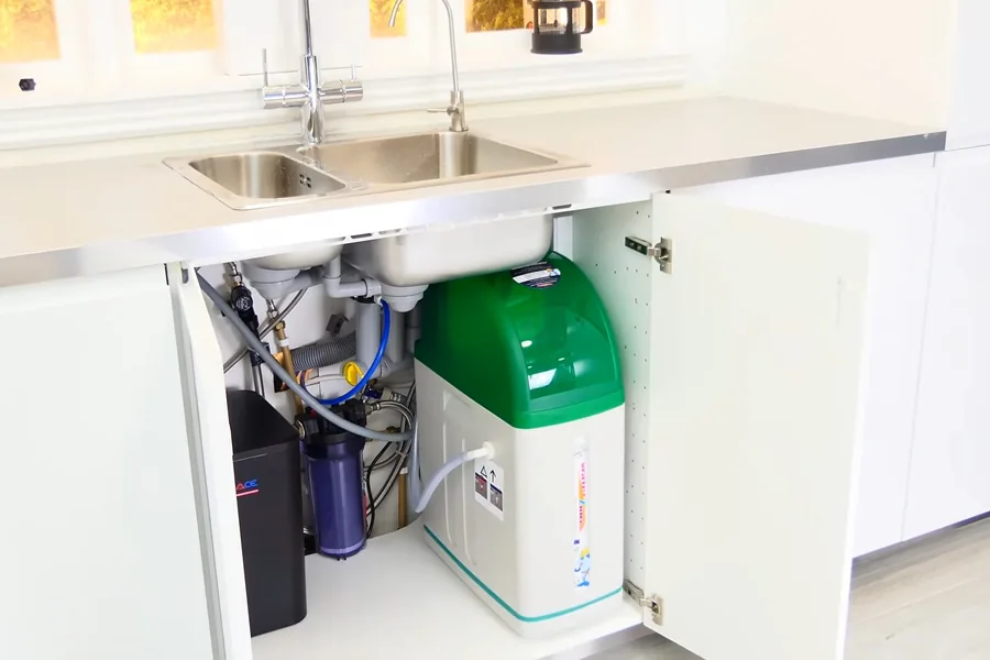 Water softener brine tank and control head during maintenance for Plumber in Irvine, CA in Irvine