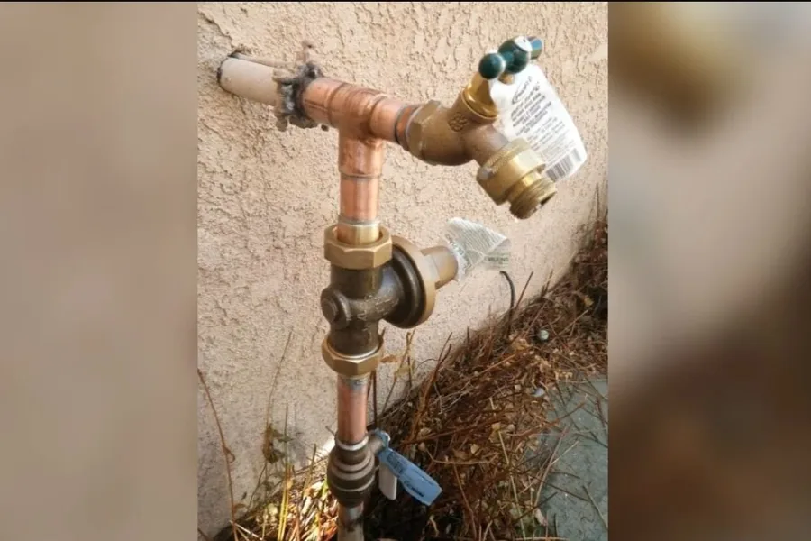 Weathered outdoor shutoff valve and hose bib connection for 7 Early Warning Signs You Need a Plumber in Fountain Valley